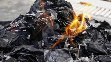 Closeup Of Paper On Fire In Karachi Pakistan 2022 photo