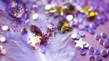 Close-up Of water drop with glitter on it in different colorful loghts in Karachi Pakistan 2022 photo