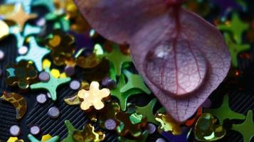 Close-up Of water drop with glitter on it in different colorful loghts in Karachi Pakistan 2022 photo
