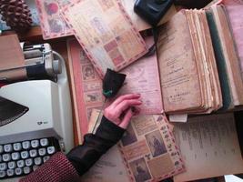 Vintage Desk Top Setting With Typewriter and Old Books In Karachi Pakistan 2022 photo