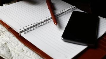 Work Bag And Office Diary On Table in Karachi Pakistan 2022 photo