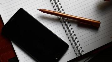 Work Bag And Office Diary On Table in Karachi Pakistan 2022 photo