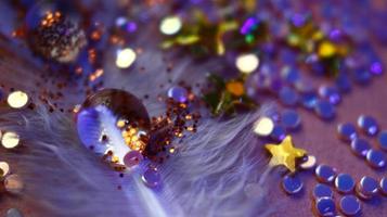 Close-up Of water drop with glitter on it in different colorful loghts in Karachi Pakistan 2022 photo