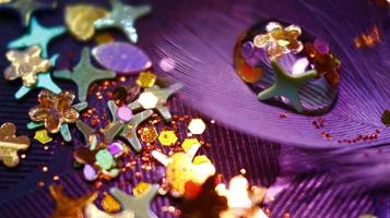 Close-up Of water drop with glitter on it in different colorful loghts in Karachi Pakistan 2022 photo