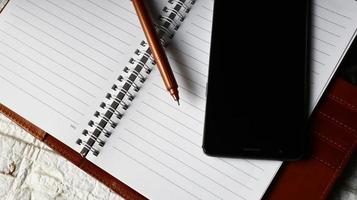 Work Bag And Office Diary On Table in Karachi Pakistan 2022 photo