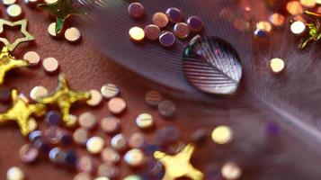 Close-up Of water drop with glitter on it in different colorful loghts in Karachi Pakistan 2022 photo