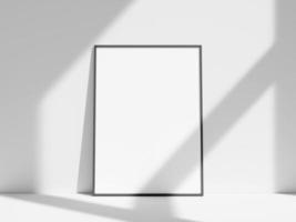 Empty frame on the white wall with window shadow photo