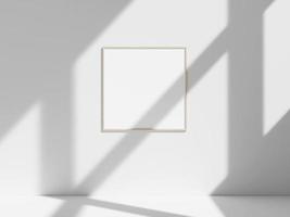 Empty frame on the white wall with window shadow photo