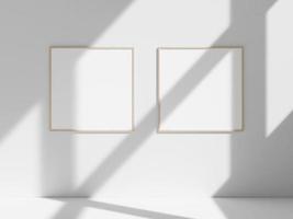 Empty frame on the white wall with window shadow photo