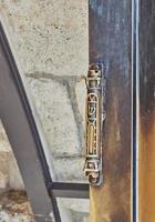 Mezuzah at the entrance to the room near the wailing wall photo