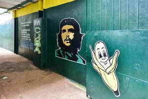 Entrance to a fruit stand in Old Havana, Cuba with the words Live Cuba and a picture of Che and a banana, 2022 photo