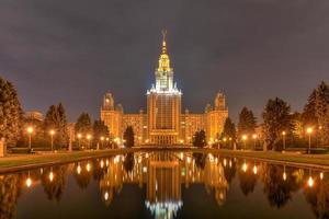 Night view of the Moscow State University in Russia. Moscow State University is a coeducational and public research university located in Moscow, Russia, 2022 photo