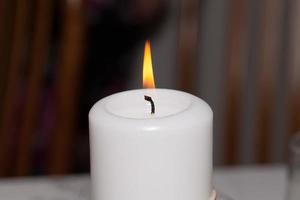 Flame of white candle photo