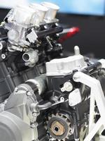 Closeup detail of new engine technology shiny and clean from factory the transportation concept photo