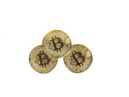 Closeup three bitcoin golden the crypto digital money concept on white background isolated photo