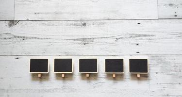 Small chalk board array on table top view photo