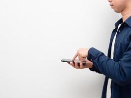 Man holding cell phone and touch screen for shopping with copy space side view photo