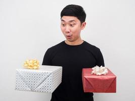Man feeling excited with gif box in his hand photo