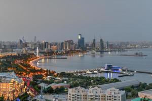 Panoramic skyline of the city of Baku, Azerbaijan at dusk. photo