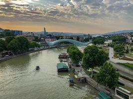 The Bridge of Peace in Tbilisi, a pedestrian bridge over the Mtkvari River in Tbilisi, Georgia. photo