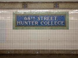 New York City - March 26, 2019 -  Sign for the 68th Street Subway stop along the New York City subway. photo
