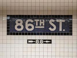 New York City - March 26, 2019 -  Sign for the 86th Street Subway stop along the New York City subway. photo