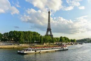 The Eiffel Tower, a wrought iron lattice tower on the Champ de Mars in Paris, France. photo