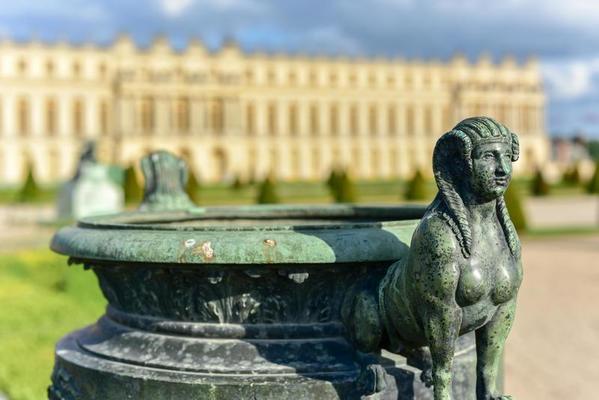 Statuette in the gardens of the famous Palace of Versailles in France.