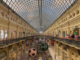 Moscow, Russia - July 16, 2018 -  Inside famous GUM the large store in the Kitai-gorod part of Moscow facing Red Square decorated during the 2018 Football World Cup. photo