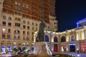 Baku, Azerbaijan - July 14, 2018 -  Monument of national poet of Azerbaijan Imadaddin Nasimi on May 28 at the center of Baku. photo