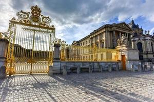 Royal Gates of Versailles Palace in France, rebuilt after three centuries. photo