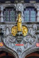 The Basilica of the Holy Blood in Market Square Bruges, West Flanders, Belgium, a UNESCO World Heritage Site. photo