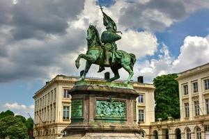 Coudenberg, the former Palace of Brussels, Belgium. The statue of Godfrey, Duc of Bouillon and Church of Saint Jacques-sur-Coudenberg in Royal Square. photo