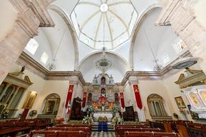 Campeche, Mexico - May 25, 2021 -  San Francisco de Campeche Cathedral by Independence Plaza in Campeche, Mexico. photo