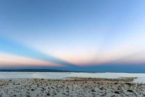 Sunset at White Sands National Monument in New Mexico. photo