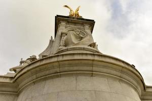 Imperial Memorial to Queen Victoria in front of Buckingham Palace in London, UK which was built in honor of Queen Victoria, who reigned for almost 64 years, 2022 photo