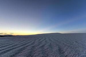 Sunset at White Sands National Monument in New Mexico. photo