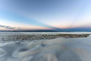 Sunset at White Sands National Monument in New Mexico. photo