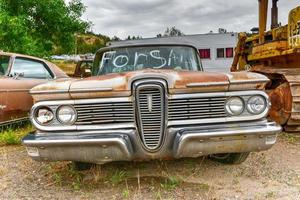 Rusting old car in a desert junk yard in Arizona, USA, 2022 photo