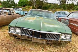 Rusting old car in a desert junk yard in Arizona, USA, 2022 photo