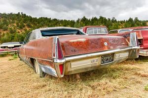 Rusting old car in a desert junk yard in Arizona, USA, 2022 photo