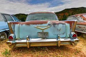 Rusting old car in a desert junk yard in Arizona, USA, 2022 photo