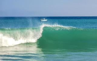 Extremely huge big surfer waves at beach Puerto Escondido Mexico. photo