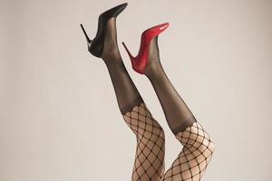 female legs with different type of high heels photo