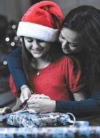 A happy Christmas concept. Mother and Daughter in a Christmas mood. photo