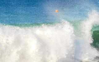 Extremely huge big surfer waves at beach Puerto Escondido Mexico. photo