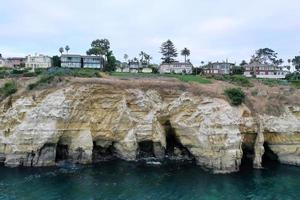 The Blue Waters of the Pacific Ocean Coastline Along the Beach of La Jolla, California. photo