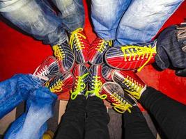 Red and blue bowling shoes in Germany. photo