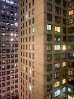 New York cityscape at night up close of towering building, 2022 photo