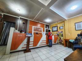 Central Java, Indonesia in October 2022. Several people are queuing and waiting at the BPKB service office or vehicle certificate of ownership at the Jepara Police photo